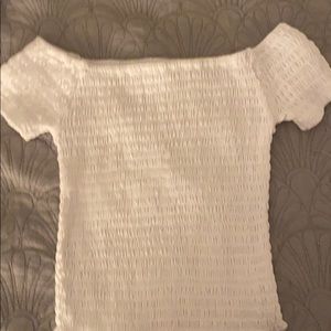 White sleeveless top